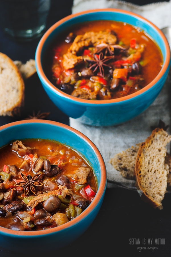 Two bowls of vegan soy curl chili with fava beans.