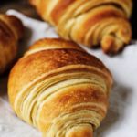 A detailed shot of a croissant.