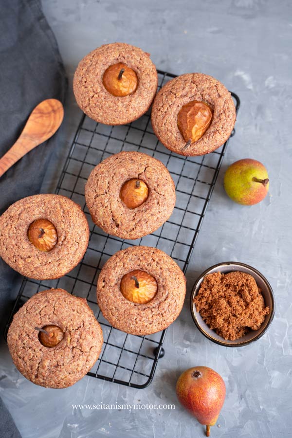 Flatlay photo of the wholesome pear muffins on a cookie tray.